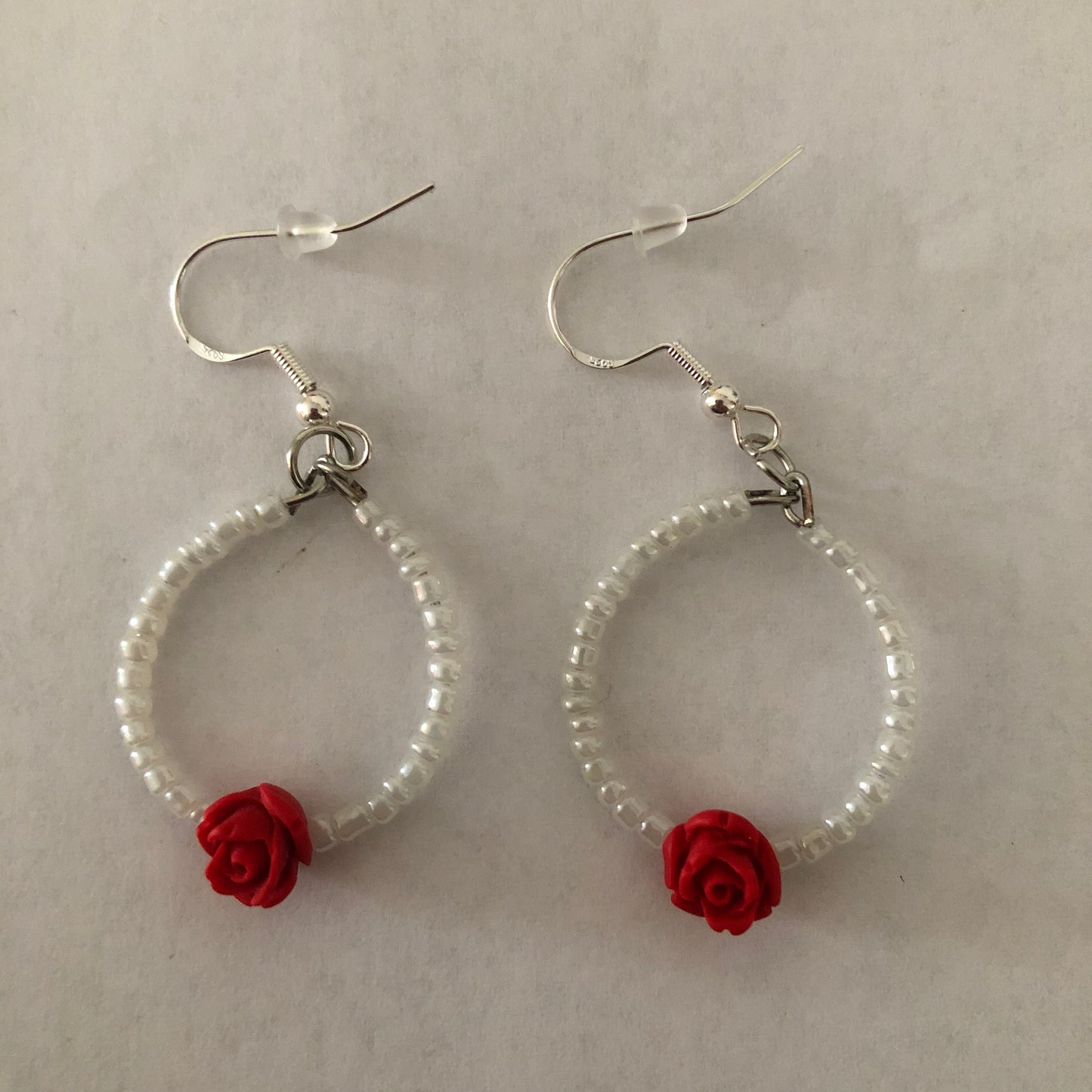 Hoop earrings with a rose