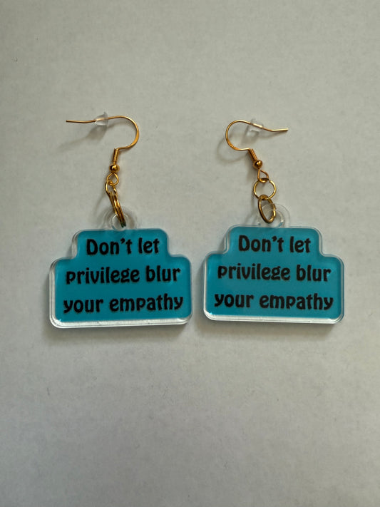 Don’t let privilege blur your empathy earrings