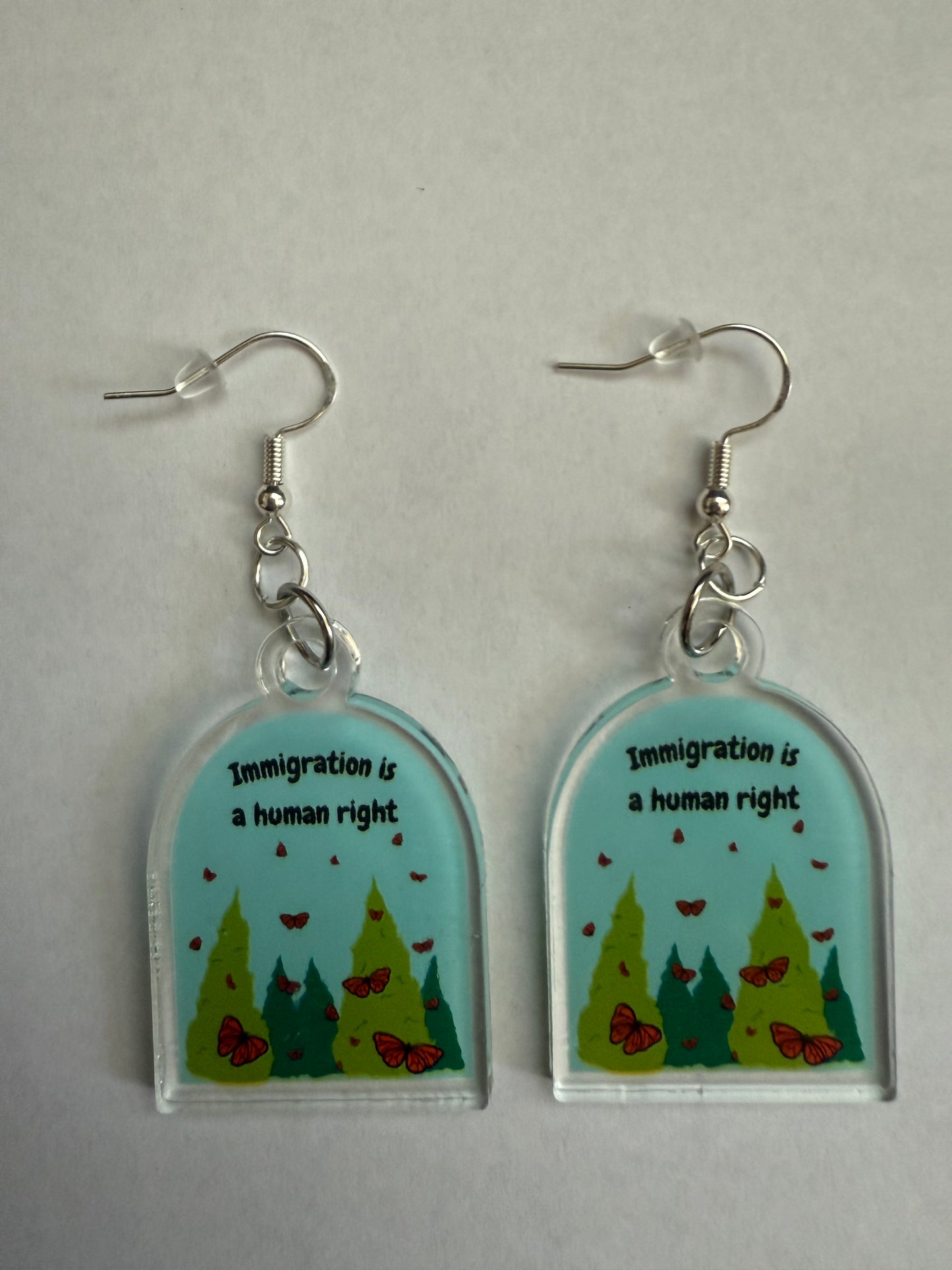 Immigration is a human right earrings