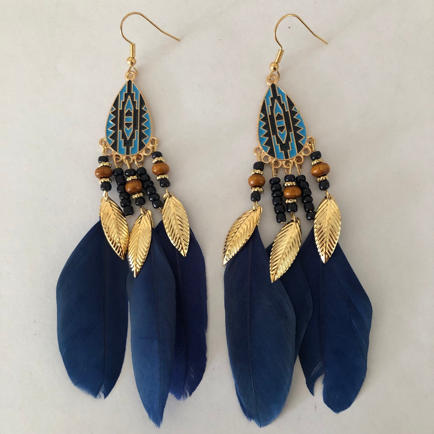 Drop dangle earrings with feathers