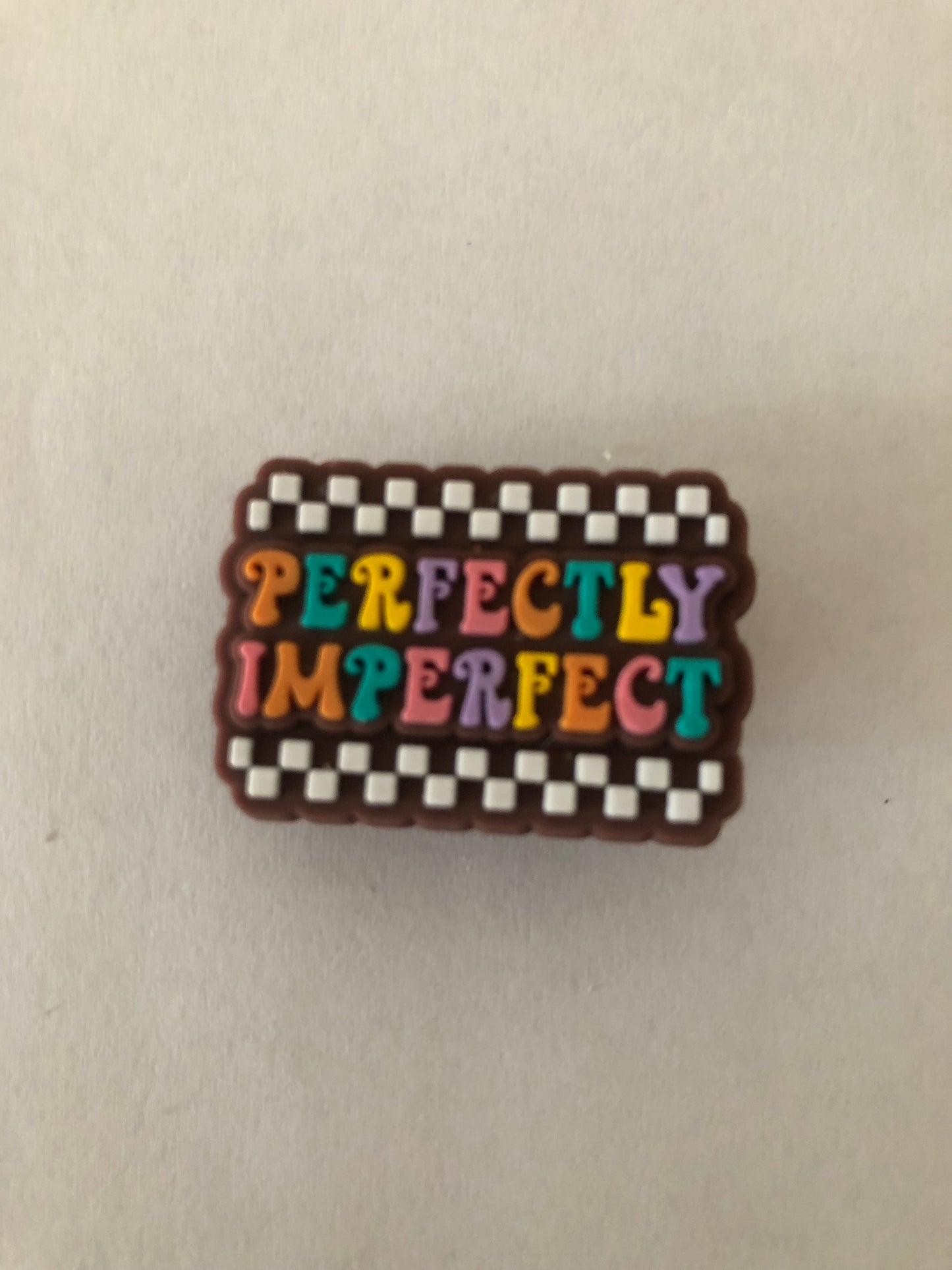 Perfectly imperfect shoe charm