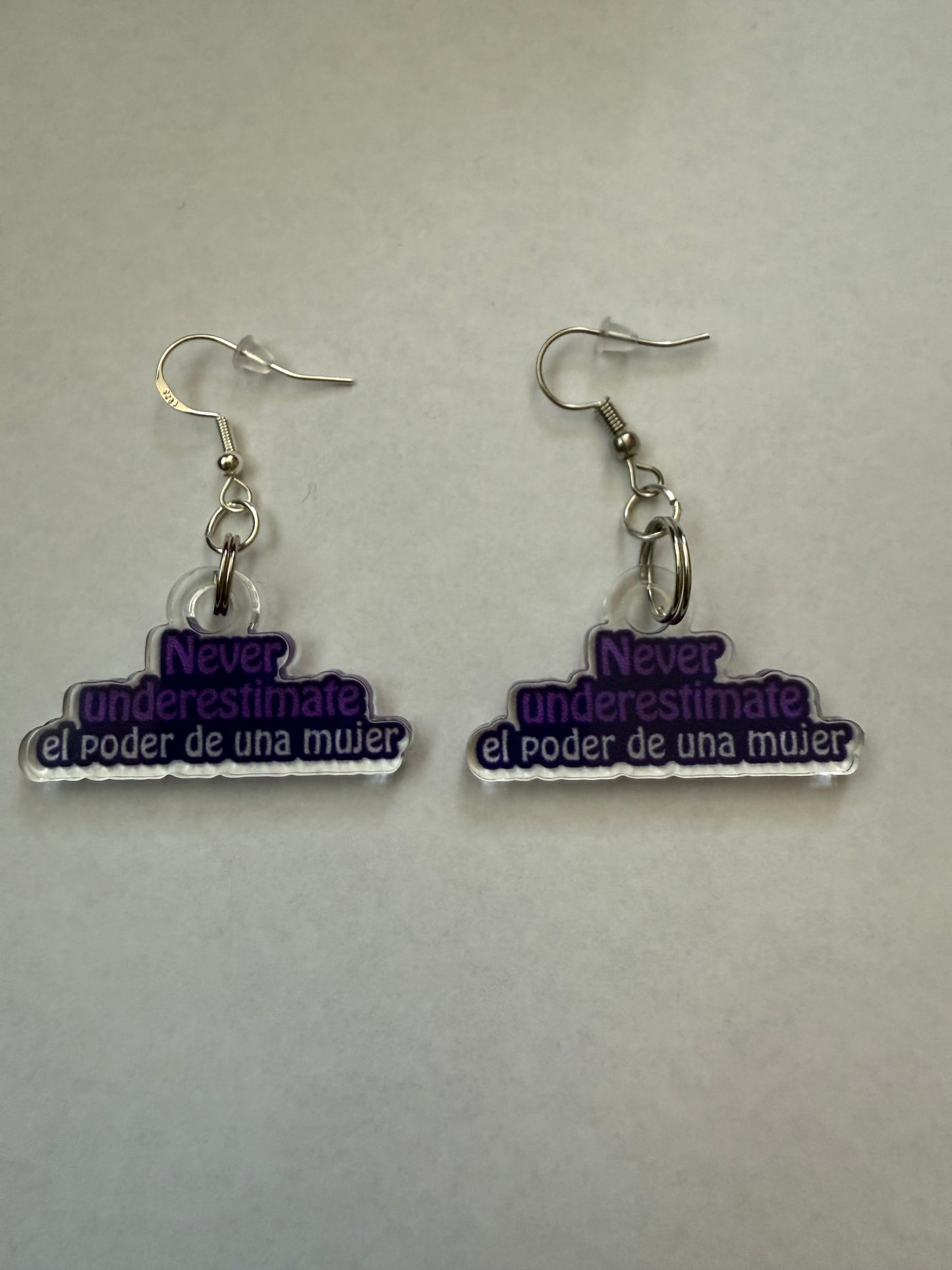 Never underestimate el poder de una mujer earrings