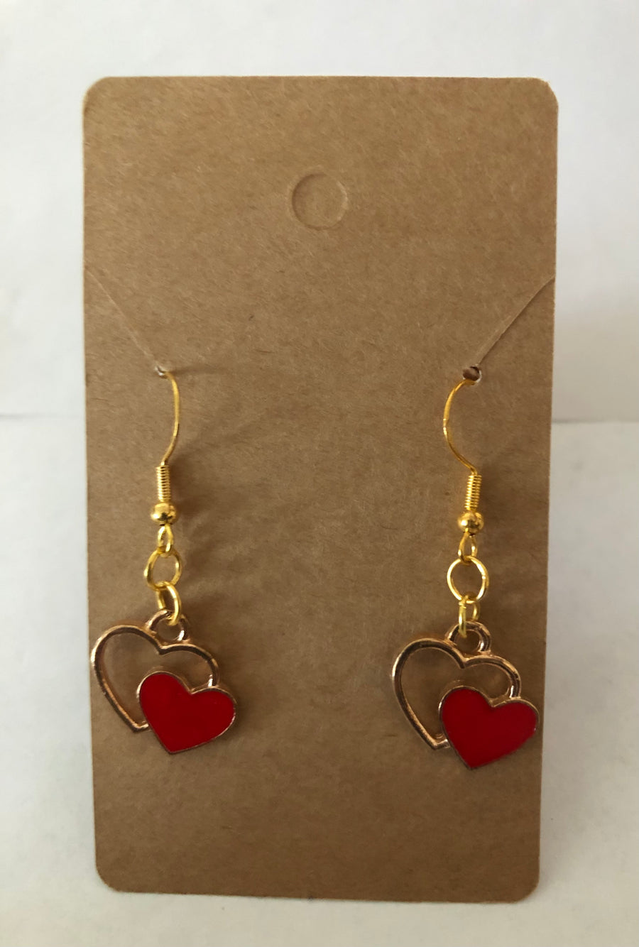 Jewelry set | Beaded bracelet with charms and a pair of heart-shaped earrings