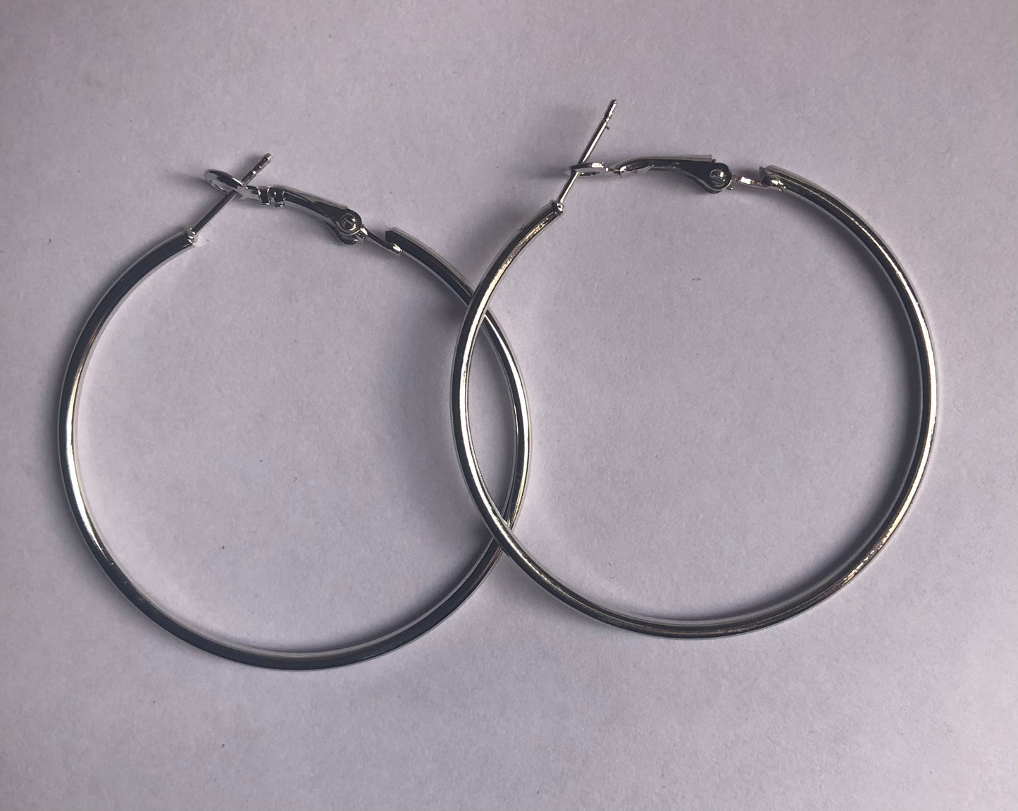 Jewelry set | Bracelet with feather charms and a pair of hoops