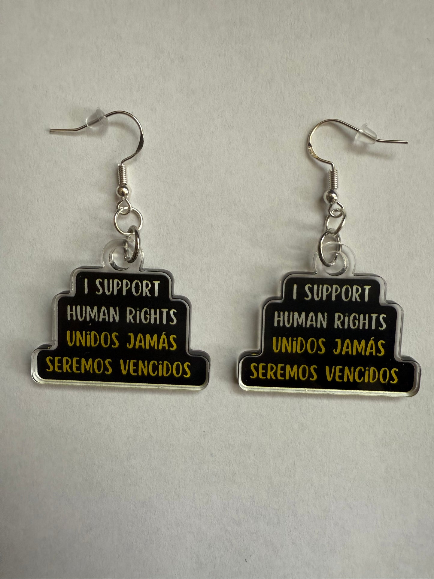 I support human rights Unidos jamás seremos vencidos earrings