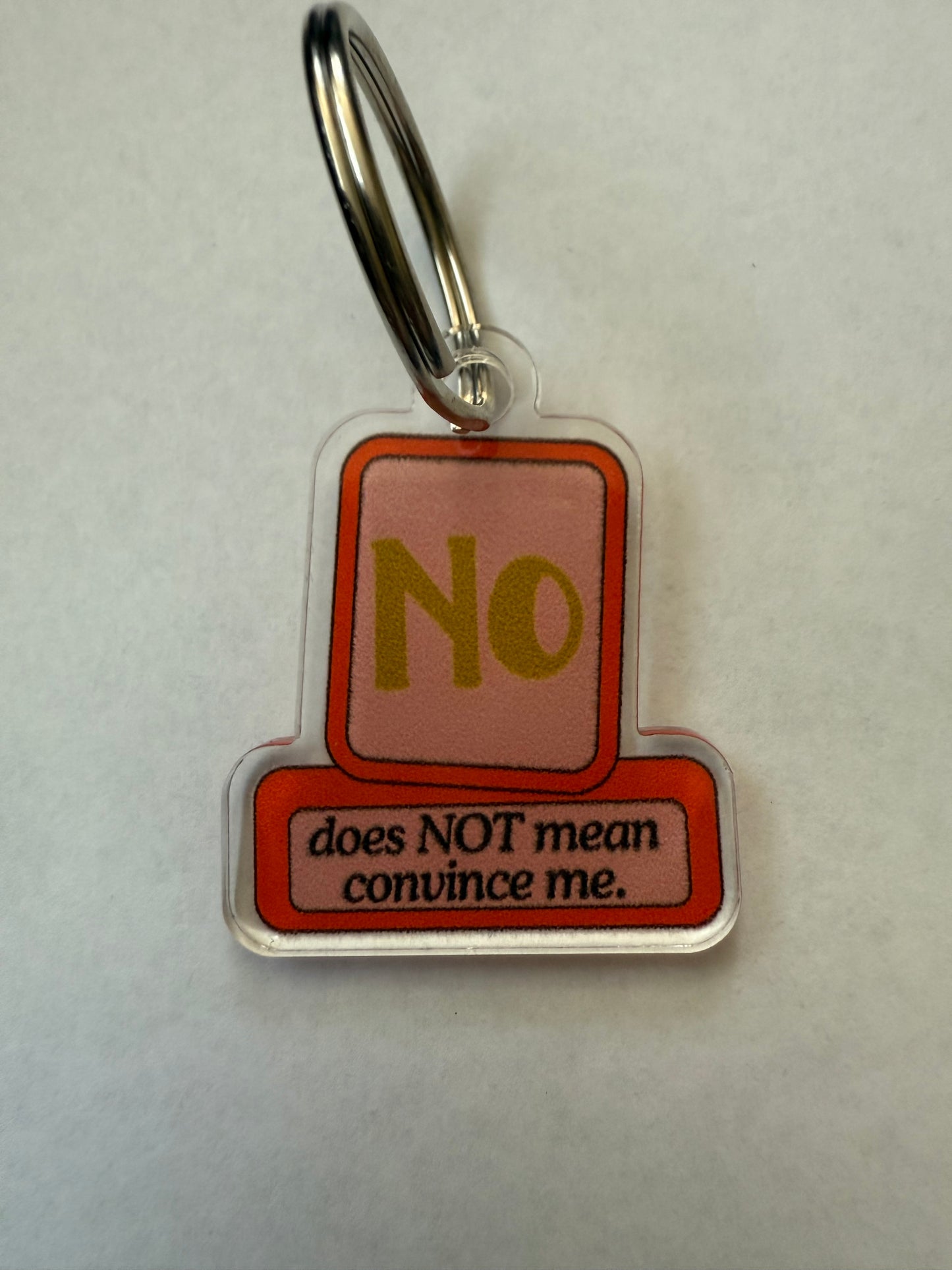 No does not mean convince me keychain
